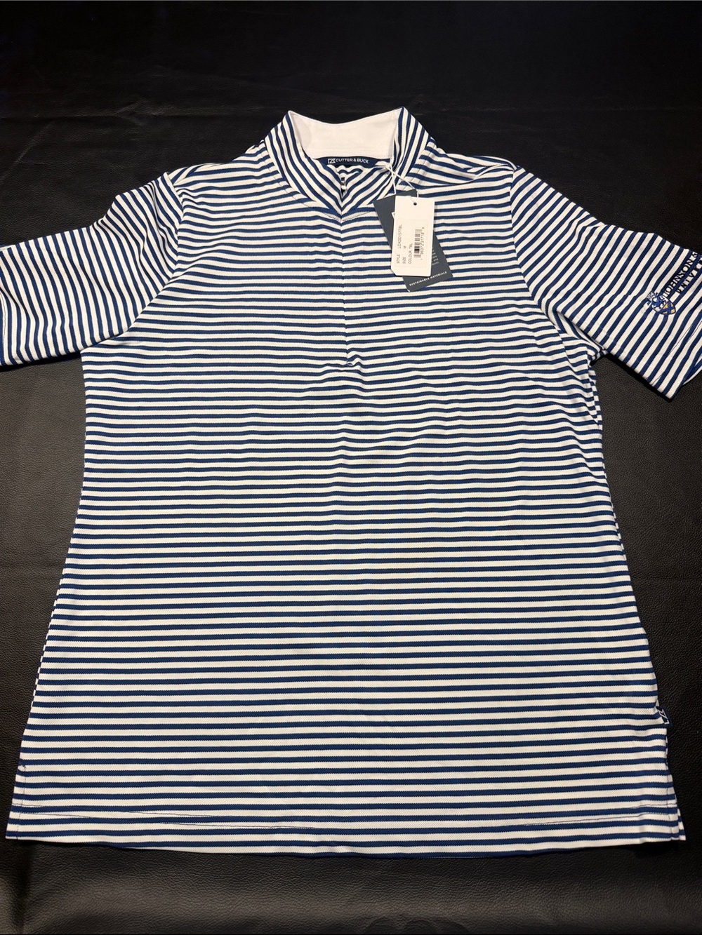 Cutter & Buck Navy and White Striped Short-Sleeve Polo Johnson & Wales logo